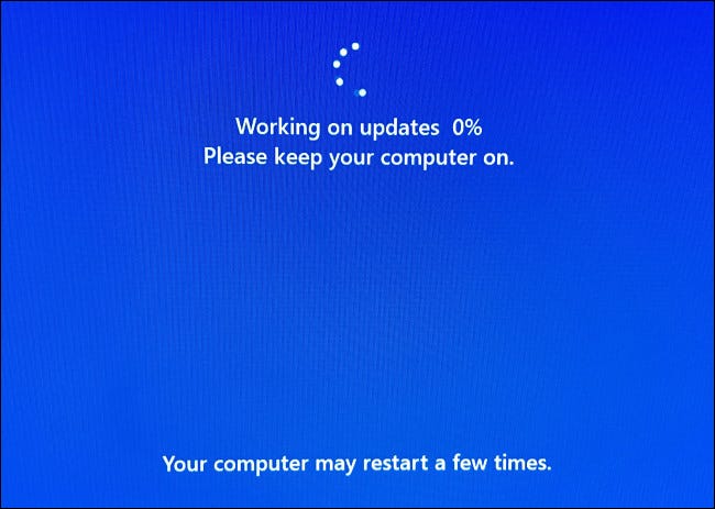 While installing, your PC will restart several times and you'll see a blue progress screen.