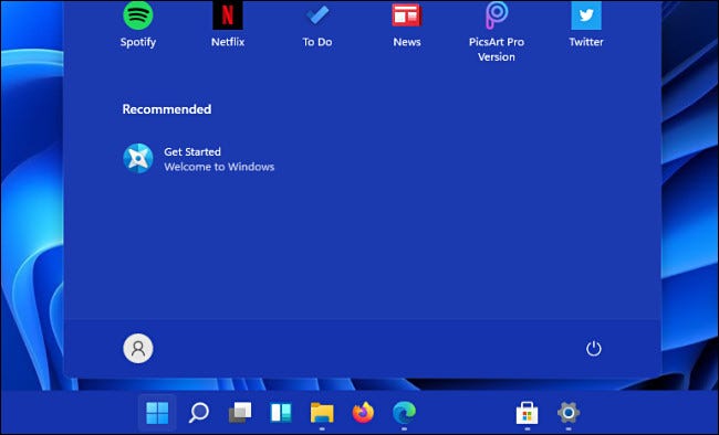 A Windows 11 start menu with no recently opened files under "Recommended."