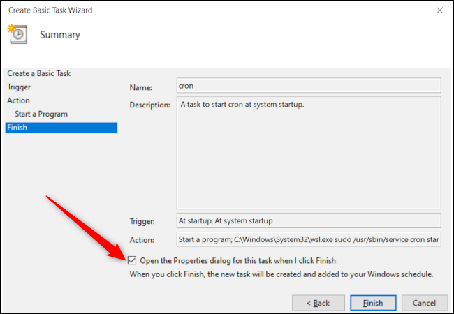 Windows 10's Task Scheduler's final task creation window with a red arrow pointing to the option to open the task properties window at finish.