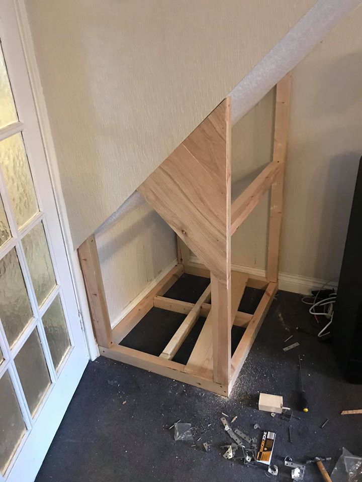 man-builds-his-rescue-dog-with-trust-issues-a-mini-house-in-the-living-room-to-let-him-have-some-alone-time-09