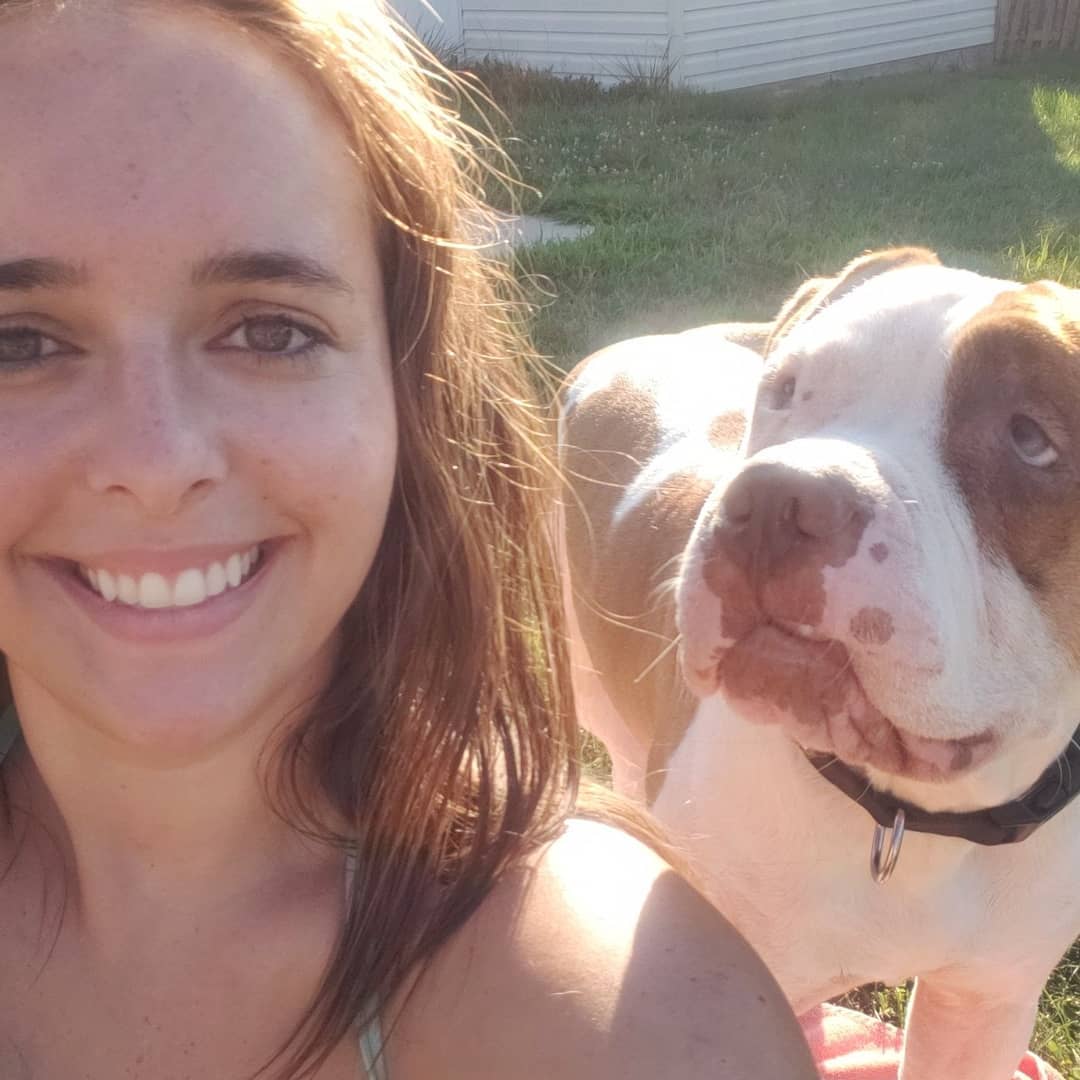 photo-of-woman-and-a-pitbull photo of woman and a pitbull